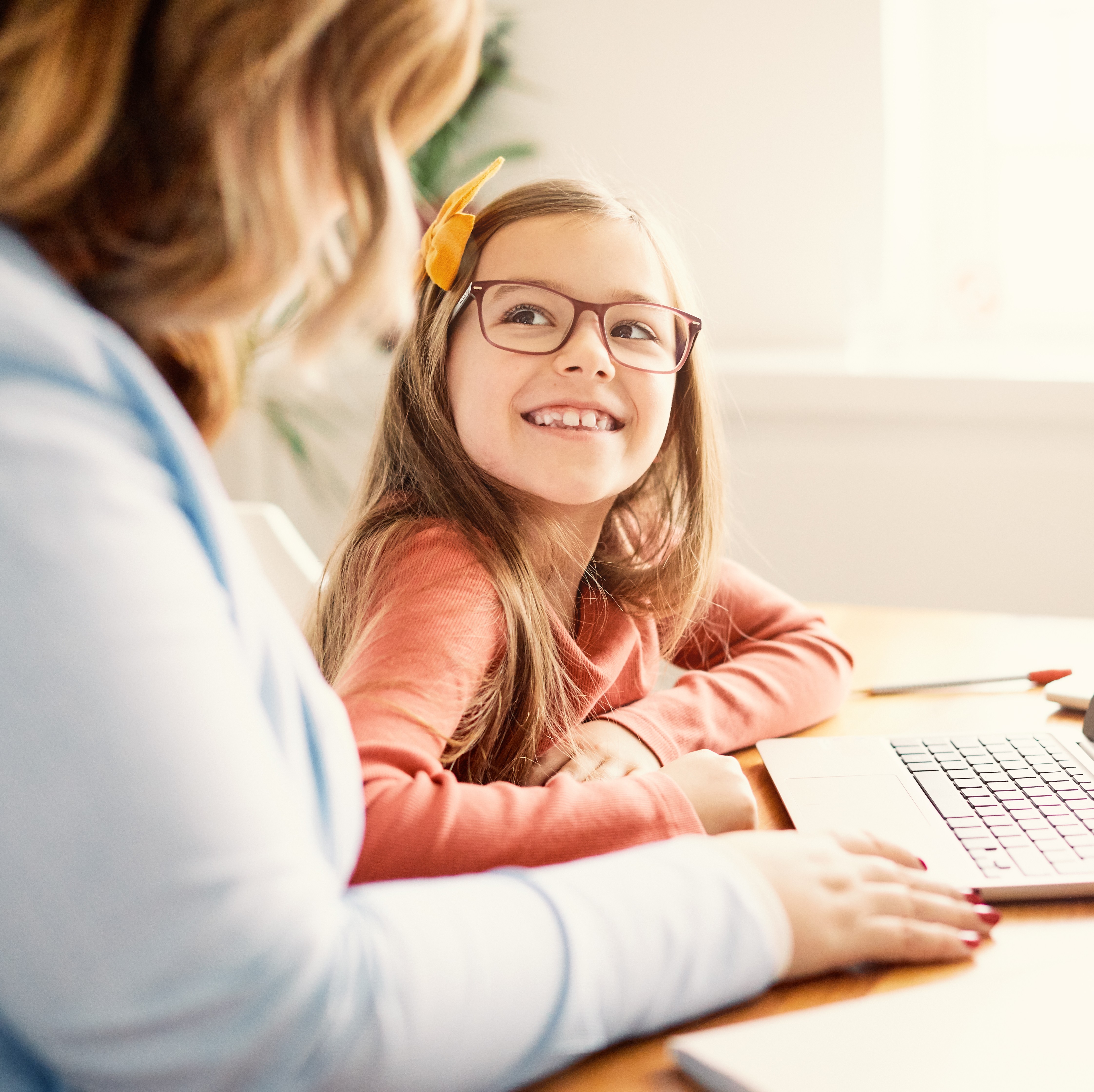 Mother and daughter enjoying math together